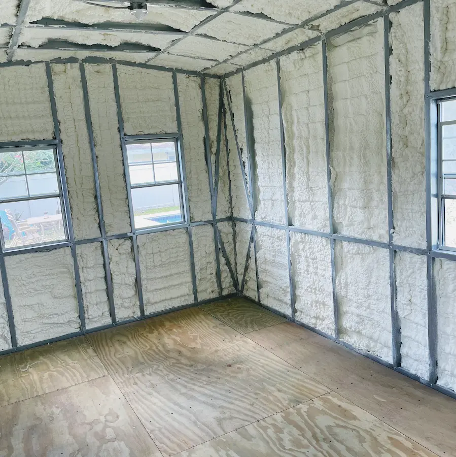 Closed-cell spray foam insulation applied to wall cavities in a residential project in Los Alamos